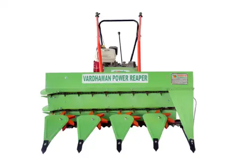 Vardhman Power Reaper harvesting paddy in Indian fields,