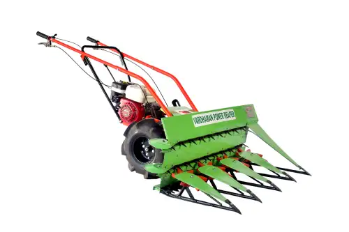 Vardhman Power Reaper harvesting paddy in Indian fields,